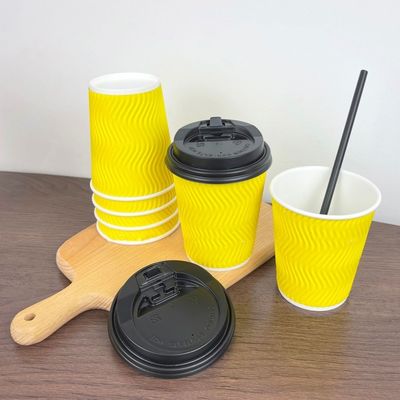 os copos de papel descartáveis de 4oz 120ml 8oz 250ml amarelam copos de café com a parede da ondinha da tampa